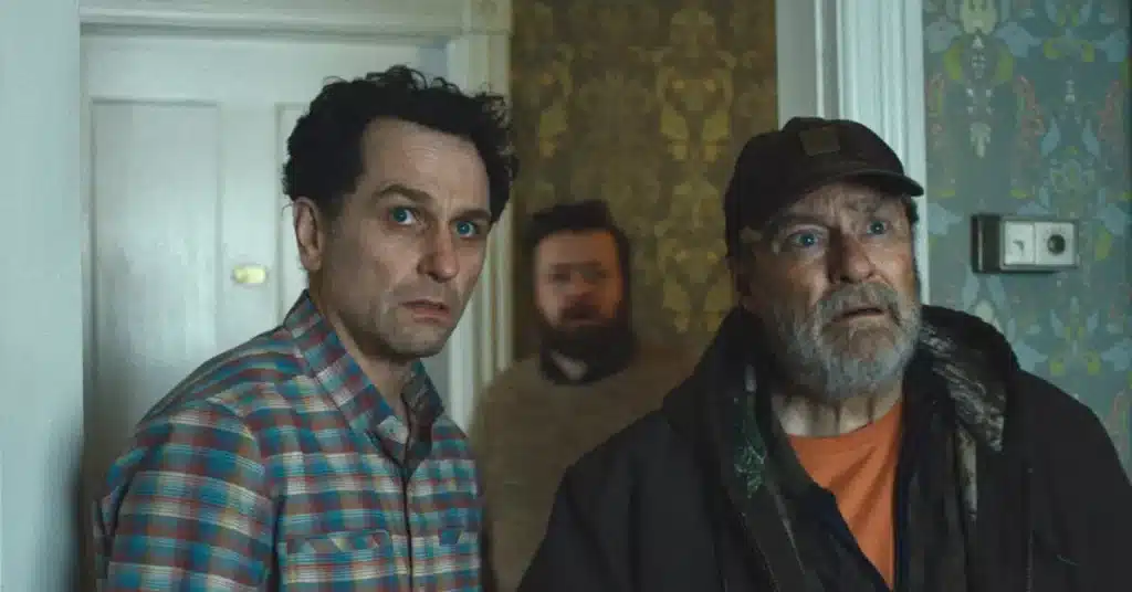 Loftis and Wyck looking into the Captain's Suite room at the Inn