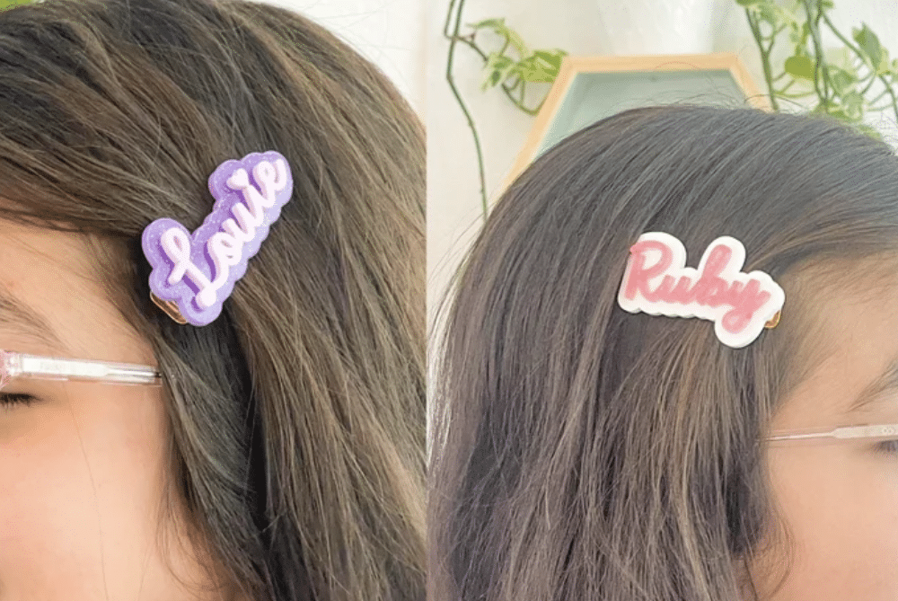 Hair pins in hair to show what they will look like when used.