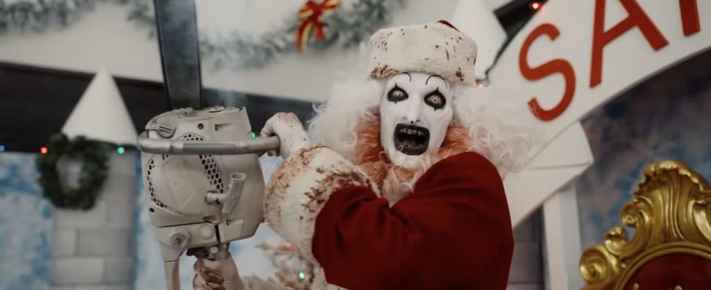 Scary Movie’s Terrifier wielding a chainsaw.