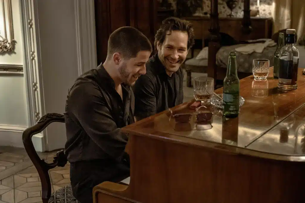 Nick Jonas as Danny Wilson jamming with Paul Rudd as Rick Power. Credit: Lionsgate Films.