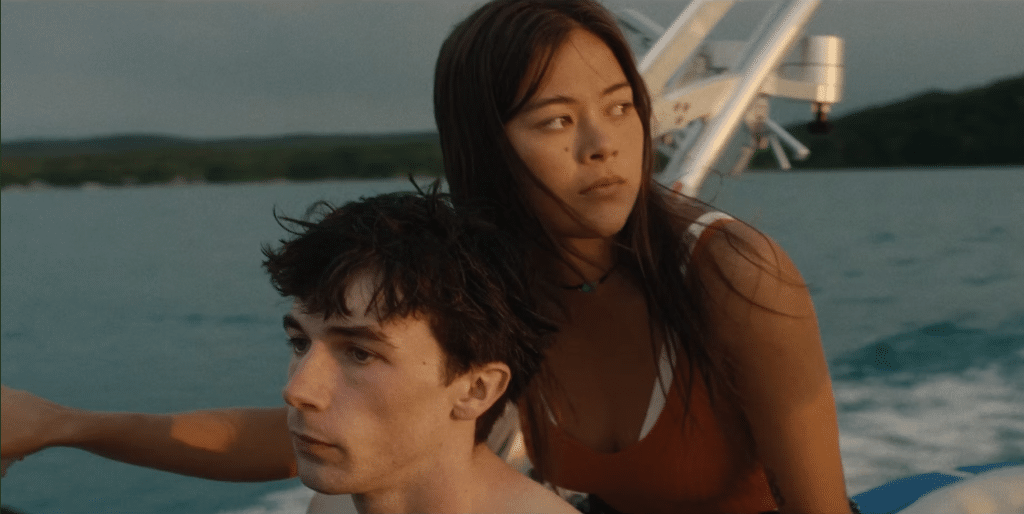 Mark McKenna and Lukita Maxwell on a boat in "An Autumn Summer."