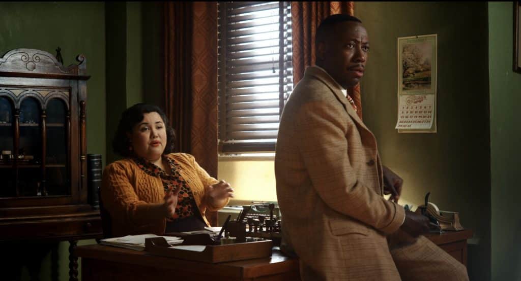 Janet and Robbie are sitting down in Ben's office.