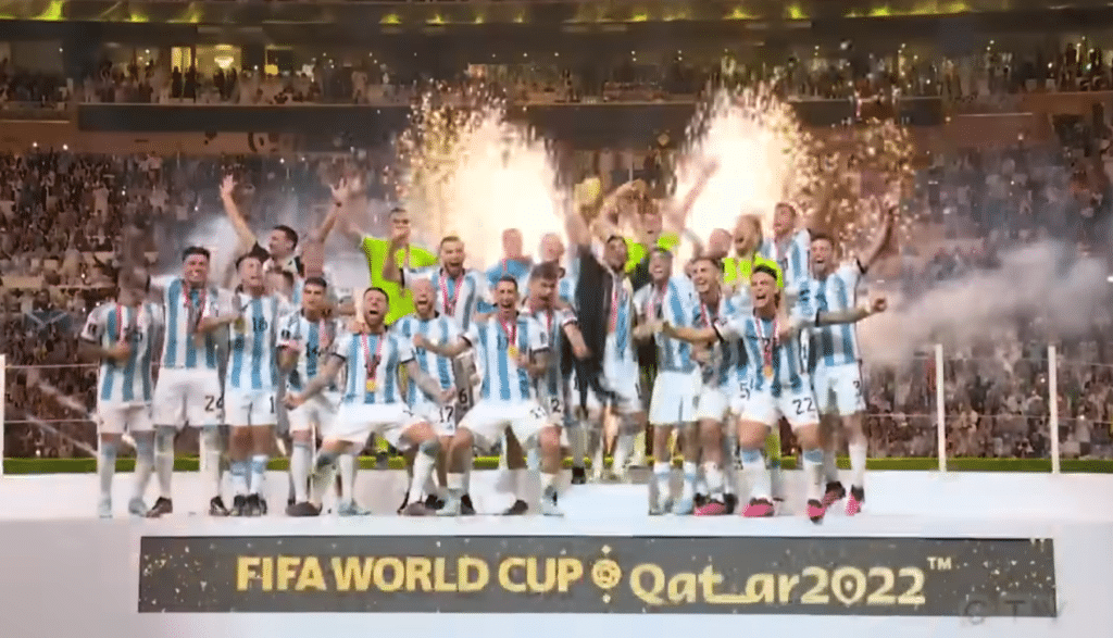Lionel Messi and Argentina lift the FIFA World Cup trophy after their victory over France in the 2022 final.