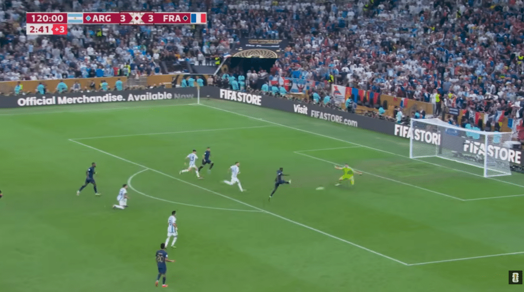 Emiliano Martínez makes a crucial save from Randal Kolo Muani during the 2022 FIFA World Cup final between Argentina and France.