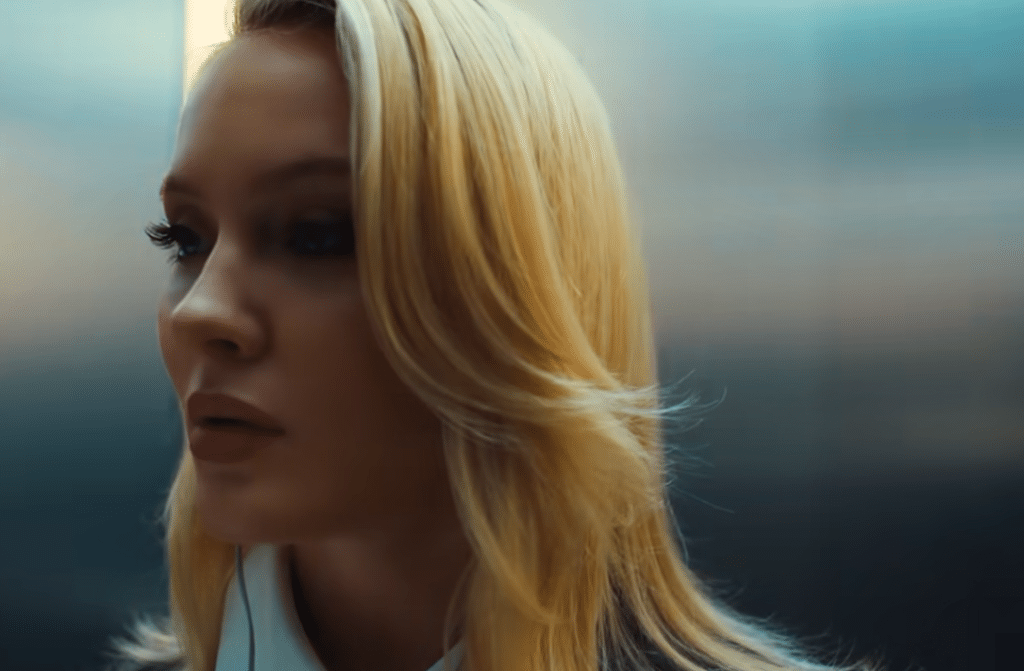 Zara Larsson in an elevator staring in "Can't Tame Her" Music Video