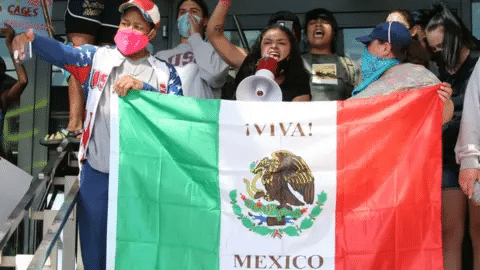 Latinx individuals at an ICE protest