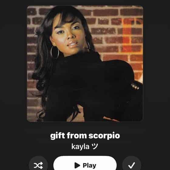 A screenshot of a spotify playlist "gift from scorpio" by kayla. The cover image is of a black pop artist staring at the viewer.
