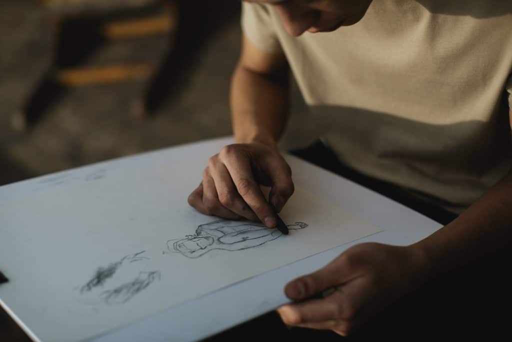 hand drawing a personalized photo for a wedding gift