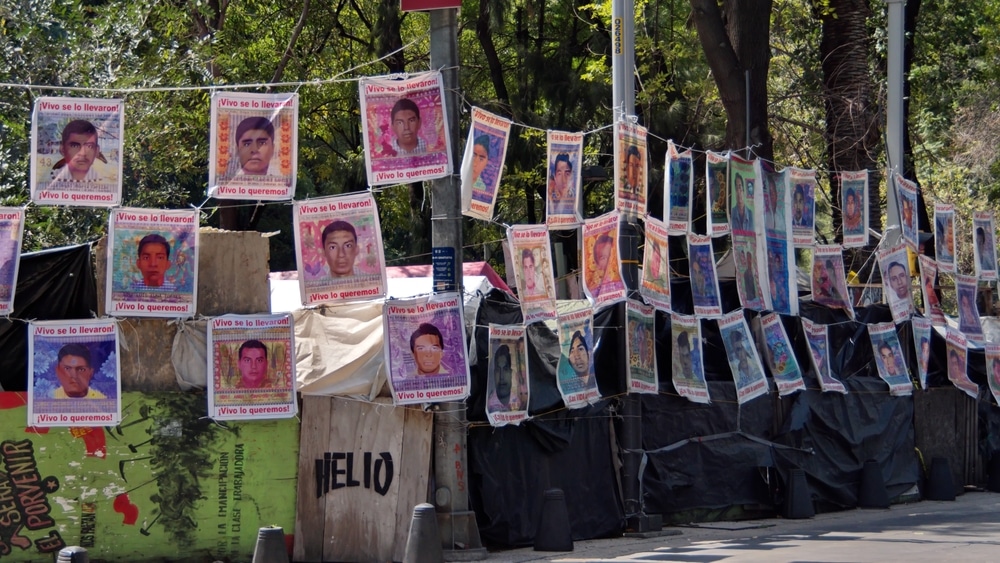 Mexico City, Mexico – October 2, 2022: Photographs of the 43 Ayotzinapa students who disappeared in the mass abduction in Iguala displayed at a memorial in the city.