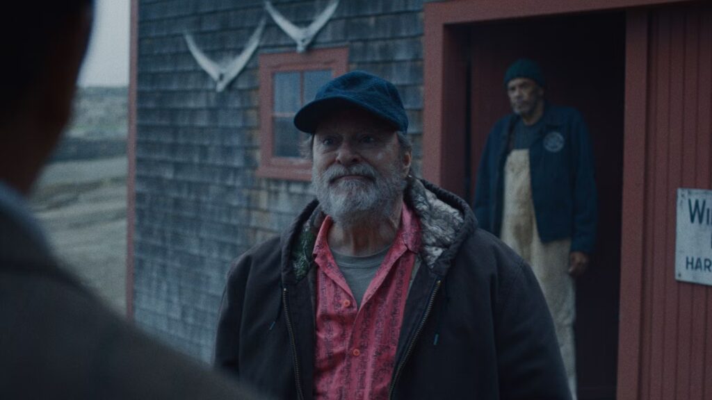 Stephen Root as Wyck, confronting Loftis