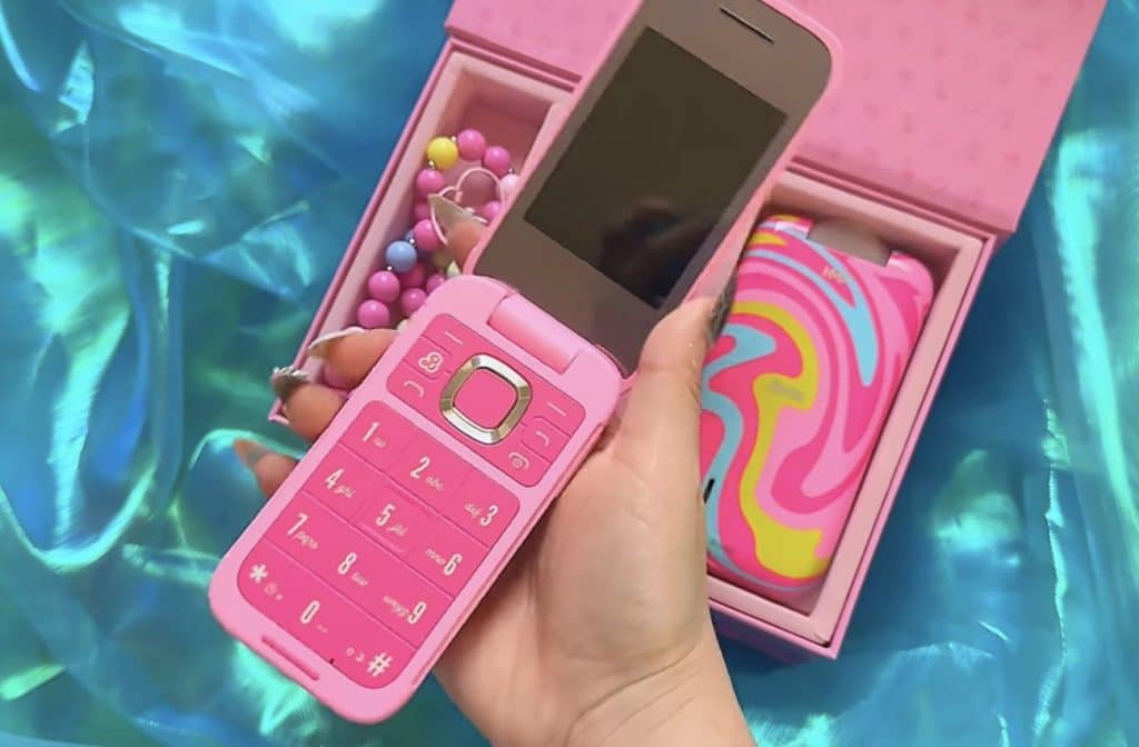 Gen Z pink Barbie flip phone