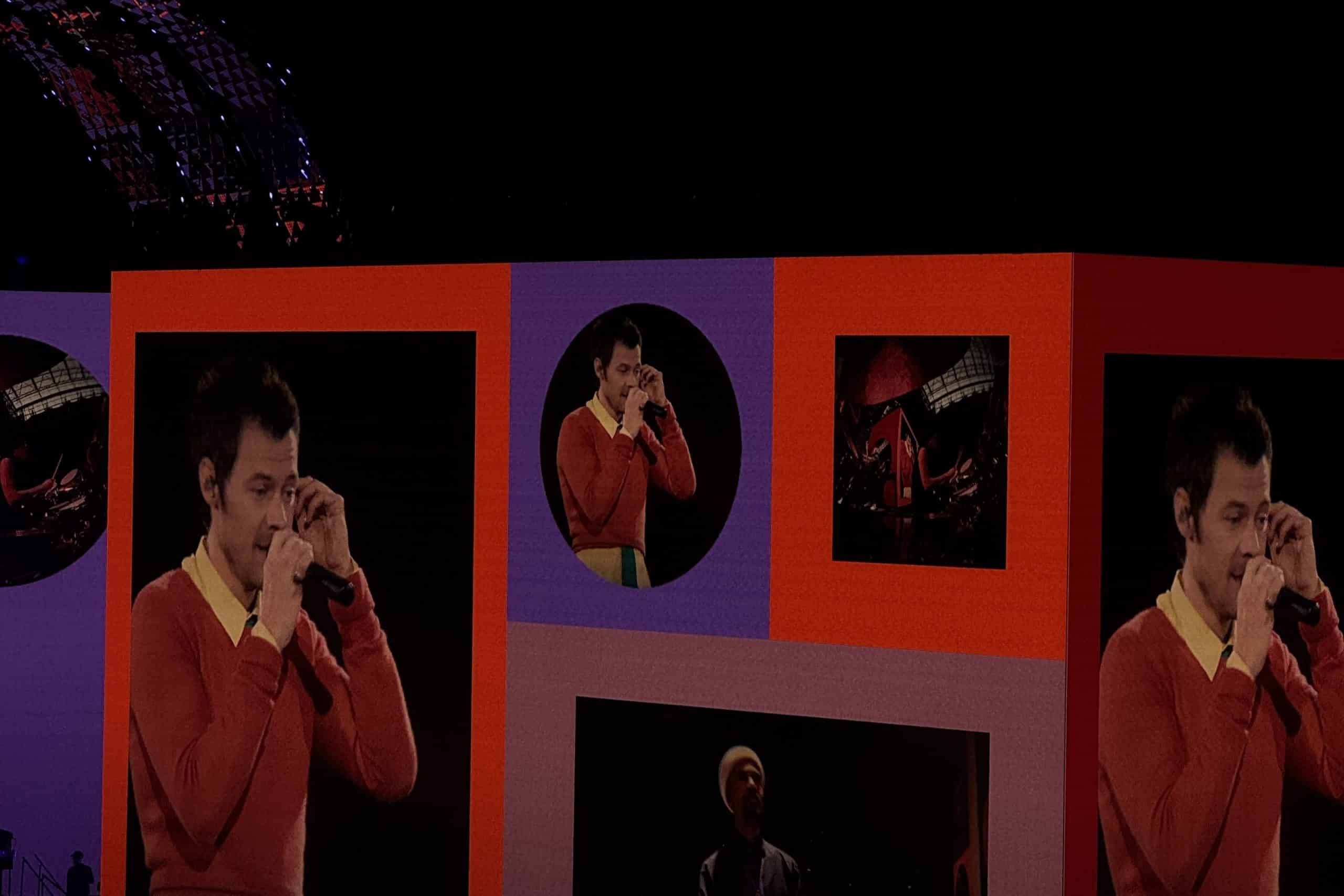 Harry Styles performing on stage