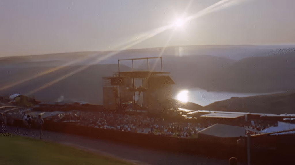 Screenshot of the stage and the crowd from afar at Sarah McLachlan's Lilith Fair.