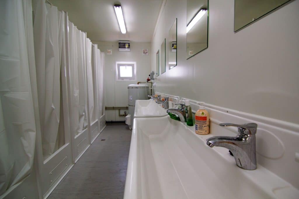 Hostel bathrooms, showers, and sinks