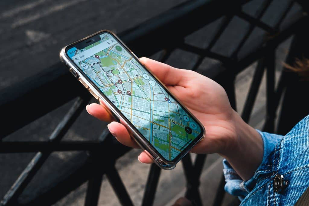 Digital map on phone screen showing hostel locations