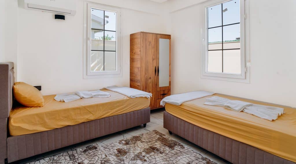 Private hostel room with two single beds
