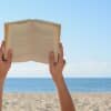Reading by the beach is a great start for your bookish activity bucket list