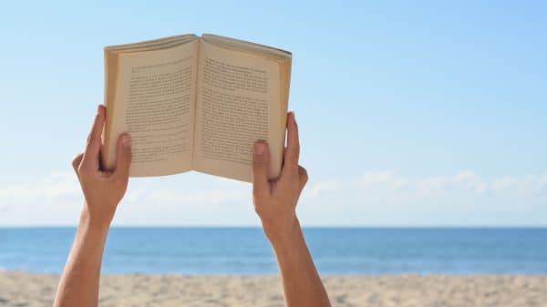 Reading by the beach is a great start for your bookish activity bucket list